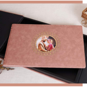 Luxury leather photo album with personalized photo cover and decorative gold frame, presented with a premium keepsake box.