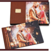 Luxury wedding photo album with metallic gala finish featuring a bride and groom portrait, displayed with matching premium presentation box by Crafted Memories.