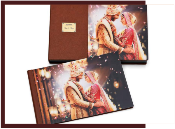 Luxury wedding photo album with metallic gala finish featuring a bride and groom portrait, displayed with matching premium presentation box by Crafted Memories.