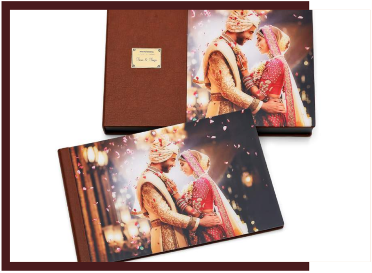 Luxury wedding photo album with metallic gala finish featuring a bride and groom portrait, displayed with matching premium presentation box by Crafted Memories.