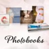 Heirloom photo book showcasing maternity and baby milestones, arranged artistically against a soft, pink watercolor background.